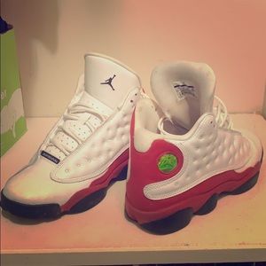 Jordan’s kids Youth 7 red white black tennis shoes